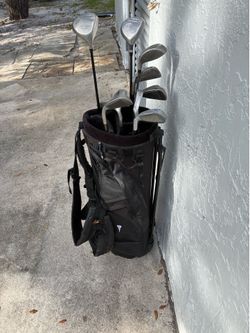 Gold clubs and bag