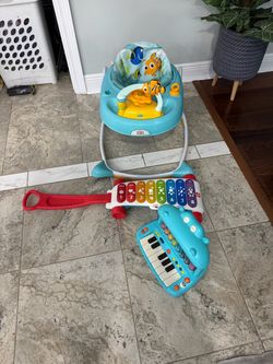 Walker and baby items selling as is $40