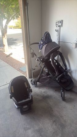 Baby 2 seater stroller and car seat/hip carrier