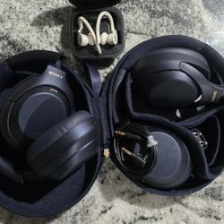 2 Sony xm4 bluetooth headphones and apple beats powerbeats pro bluetooth earbuds