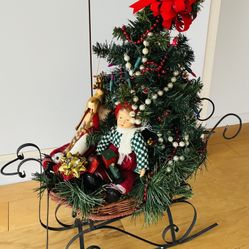 Christmas Sleigh, Wrought Iron w/Tree,Dolls,Presents,Reindeer,Beads,Lights.25”highX22” wideX11”deep.