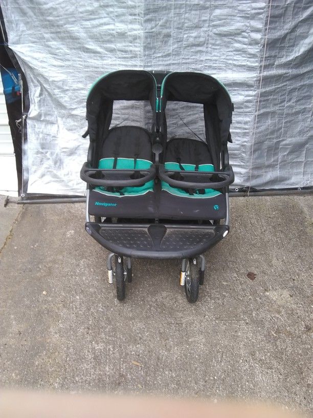 Baby Trend Foldable Double Baby Stroller With Air Tires.