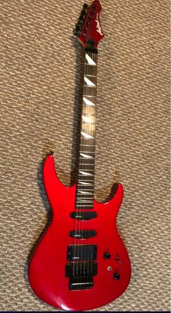 Red Electric Guitar with Floyd Rose Bridge