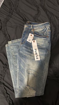 Purple Brand Men’s Distressed Slim Fit Jeans in a light wash
