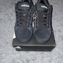 Size 8, men’s brand new unworn Adidas shoes with tags and box