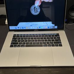 Macbook Pro 15” Retina display And Touchbar 