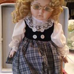 Doll In Black And White Plaid Dress.