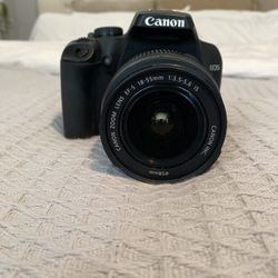 Cannon Rebel XS EOS. Comes With Charger And Lense . No Video Setting. Works Well.
