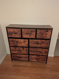 Like new! 9-Drawer Fabric Dresser with Wood Top