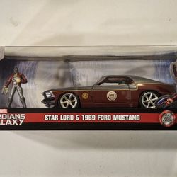 JADA 1:32 SCALE METAL DIECAST. MARVEL. GUARDIANS OF THE GALAXY.  STAR LORD.  1969 FORD MUSTANG WITH STAR LORD METAL DIECAST FIGURE. 