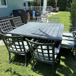 9pc Square Aluminum Outdoor Dining Set. Seating For 8 with Sunbrella cushions.