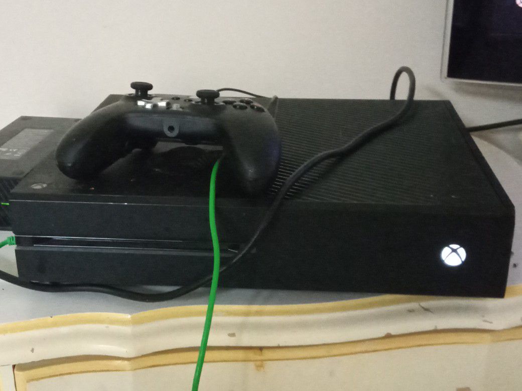 Xbox One w/ controller and two games. Will Trade For A Working Weedeater Or Edger