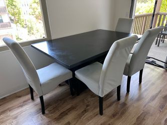 Dinner table with chairs