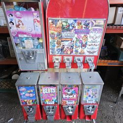 2 Bulk Vending Machines On Rack. Location Ready. Includes Prododucts, Gum, TATTOOS,Etc. All Works Fine. Ready to make $$$$ Reoccurring Revenues, week 