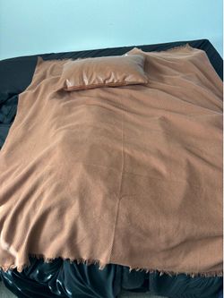 Brown blacket with pillow