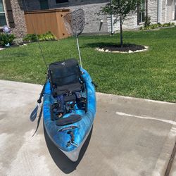 Pelican Kayak With Fishing Gear and Lifevest