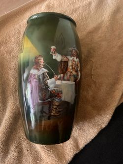 9” Vase, 5” opening. Royal Bayereuth; “2 Musketeers in a pub bar.”
