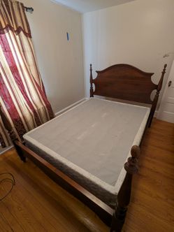 King sized bed frame with solid wood headboard and footboard