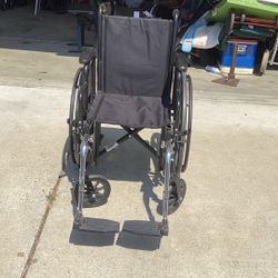 Wheelchair excellent condition very light easy to carry and fold