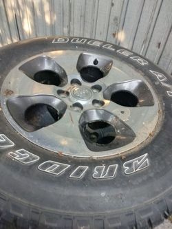 1 wheel and brand new tire, Jeep 255/70/18 , tire new , never used, $125