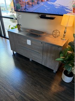 Large brown filing cabinet with additional storage