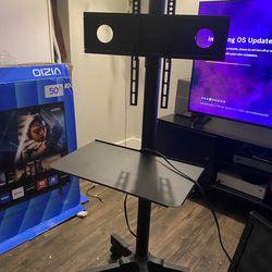 TV Stand Rollable (Holds Televisions up to 50 inches) Has Wheels