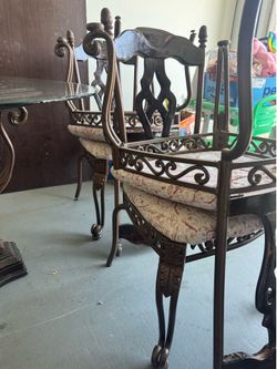 Glass table with 6 chairs