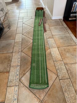 Golf putting mat