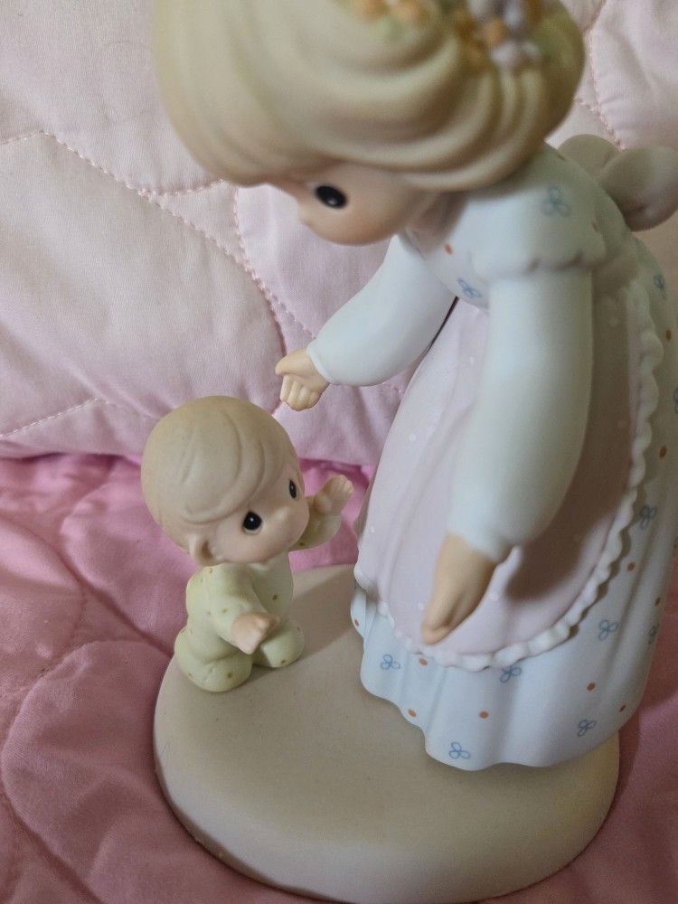 The Precious Moments figurine "Cherish Every Step" (Item #795224, 2nd Edition