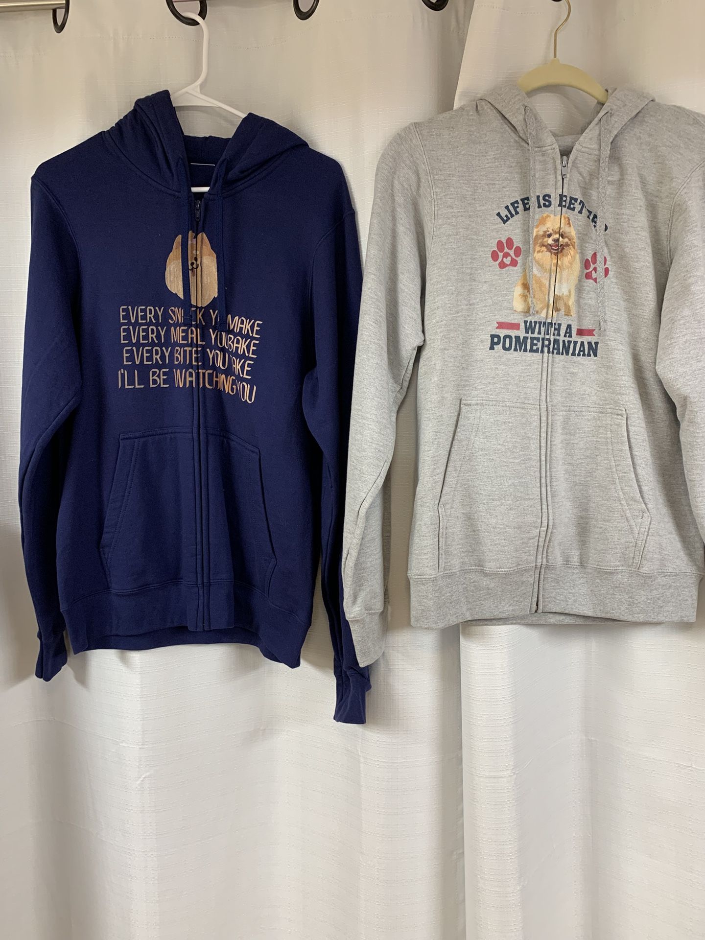 2 Hooded Sweatshirts With Pomeranians On Front And A Humorous Message
