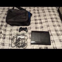 PS3 Super Slim With 7 Games and accessories