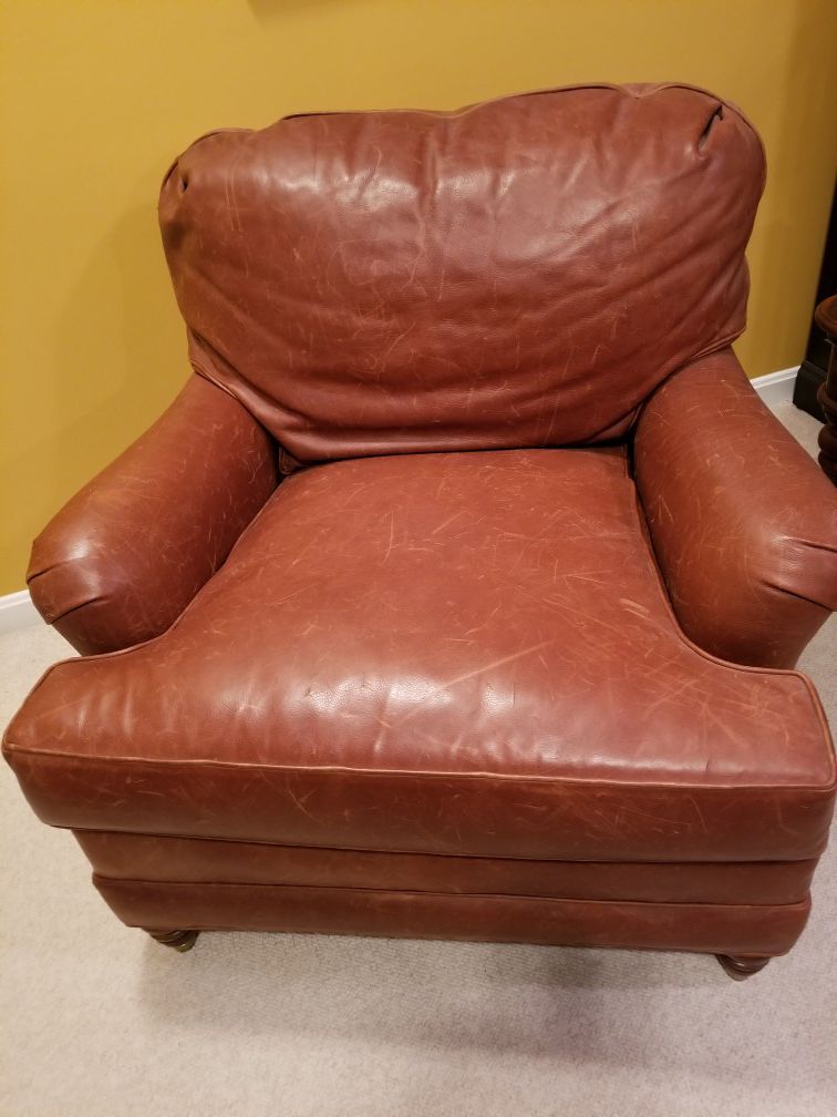 "DISTRESSED" LEATHER CHAIR AND OTTOMAN