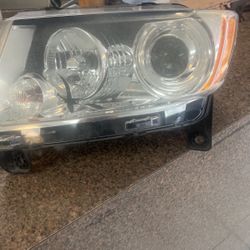 2013 HID HEADLIGHT DRIVER SIDE