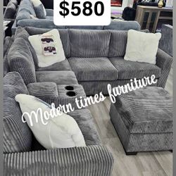 Brand New Sectional / Ottoman Included / W/USB Console & Cup Holders + Corner Wedge + Cocktail Ottoman
