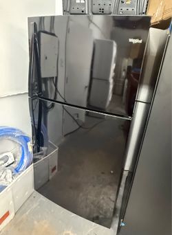 Black Whirlpool Top and Bottom Refrigerator