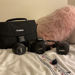 Canon DSLR camara (with 3 lenses and carry bag)