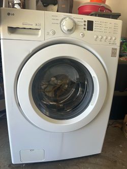 White LG Front Load washer and Gas dryer