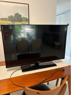 Samsung TV 35” W x 20.5 H”