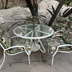 Outdoor Glass Table with 4 Chairs Incl. Cushions (Umbrella and Stand NOT included)