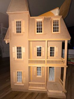 Wooden doll house make it your own