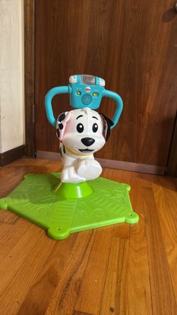 Fisher-Price Bounce & Spin Puppy Ride-On Toy