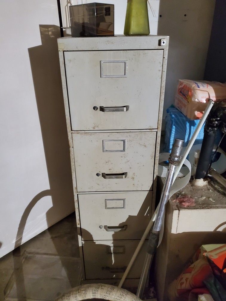 Four Drawer Filing Cabinet.