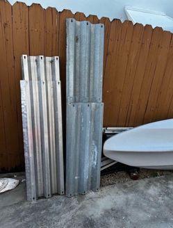 Hurricane Shutters…7 Aluminum, 12 Galvanized (ALUMINUM 1-59”/4-47”/2-48” ALL 15” WIDE) (GALVANIZED 4-71”/1-42.5”/7-40”ALL 16” WIDE)$125