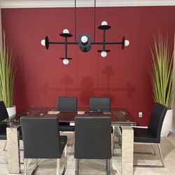 Glass Dining Table With Six Black Chairs