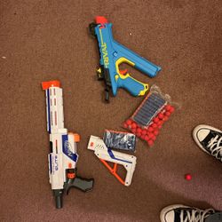 Two Nerf Guns With Ammo