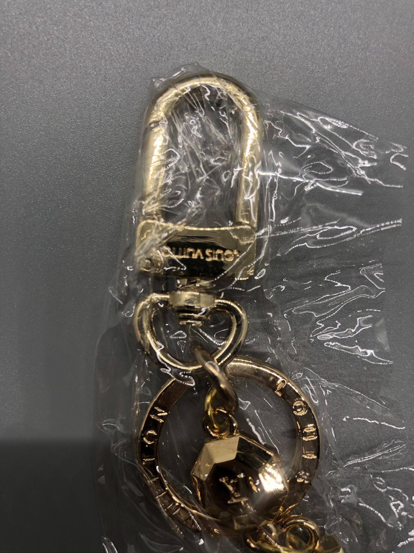 Louis Vuitton Spaceman Metal Charm/Keychain for Sale in Queens, NY - OfferUp