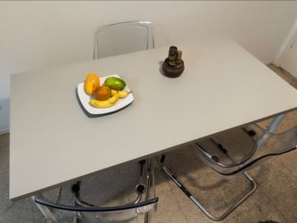 Three Ikea Tobias Chairs, one long Linnmon table. All Items in great condition,  retails for over $400
