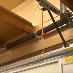 GARAGE DOORS/SPRINGS