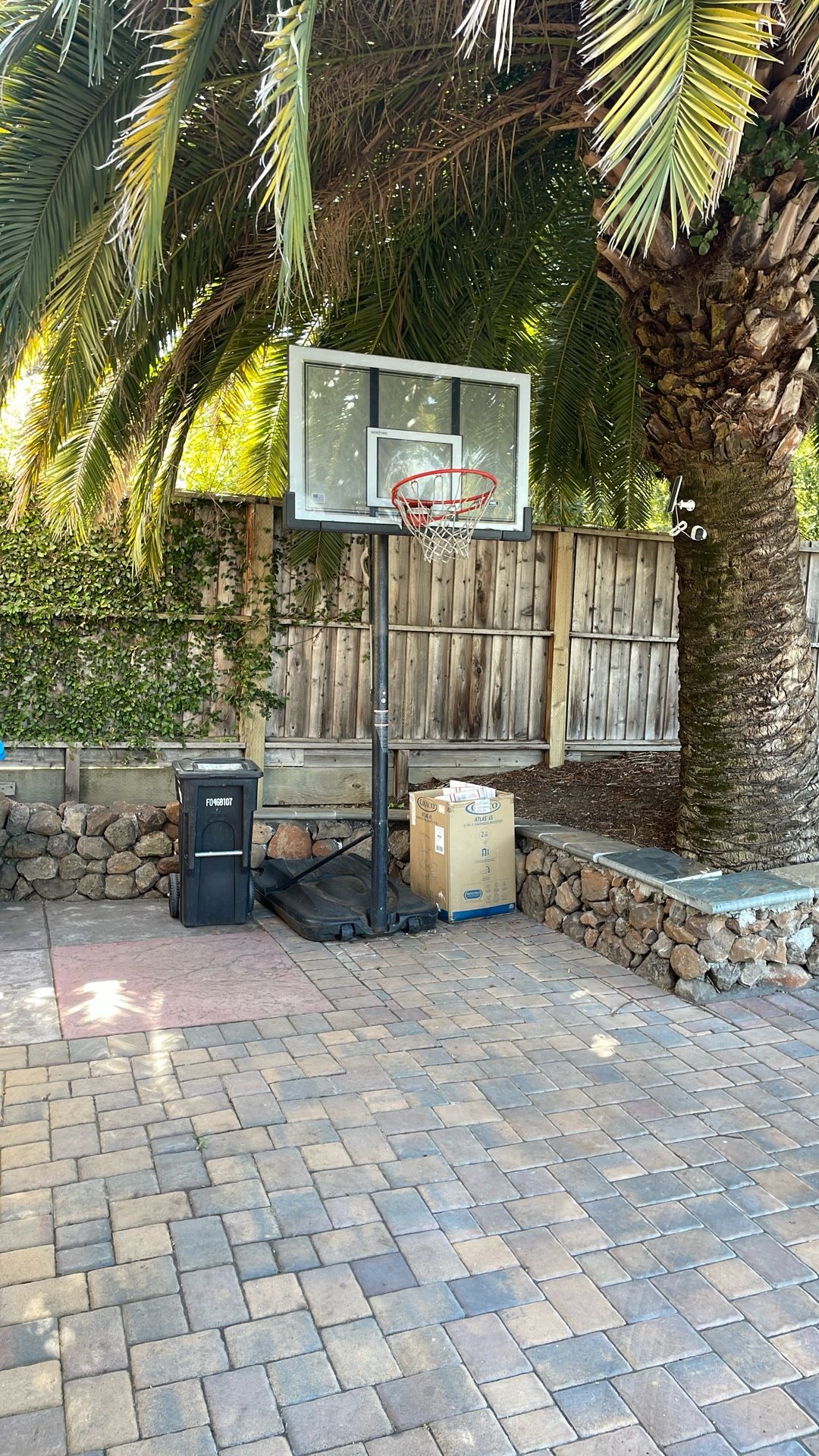 Freestanding basketball goal. Adjustable to 10 feet with weighted base.