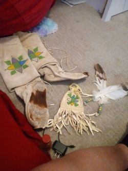 Native boots a small bag feathers